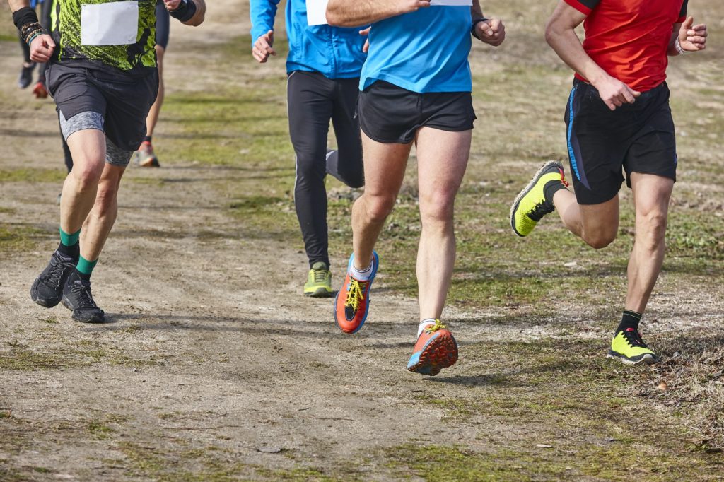 People getting outside and moving to prevent leaky gut symptoms